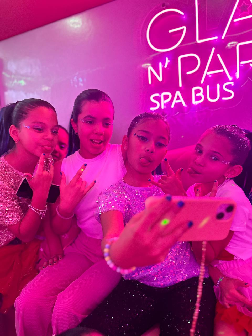 Girls taking selfies at the party